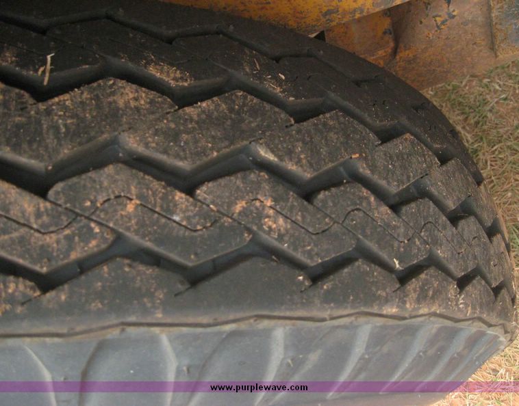 image for item 8752 Shop built 17' triple axle equipment trailer