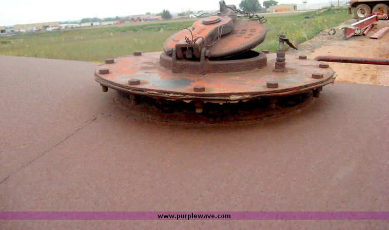 image for item 8969 Approximately 1,000 gallon water tank bed