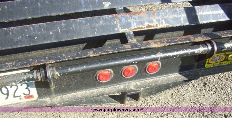 image for item 7610 2005 Deck 30' tandem axle trailer