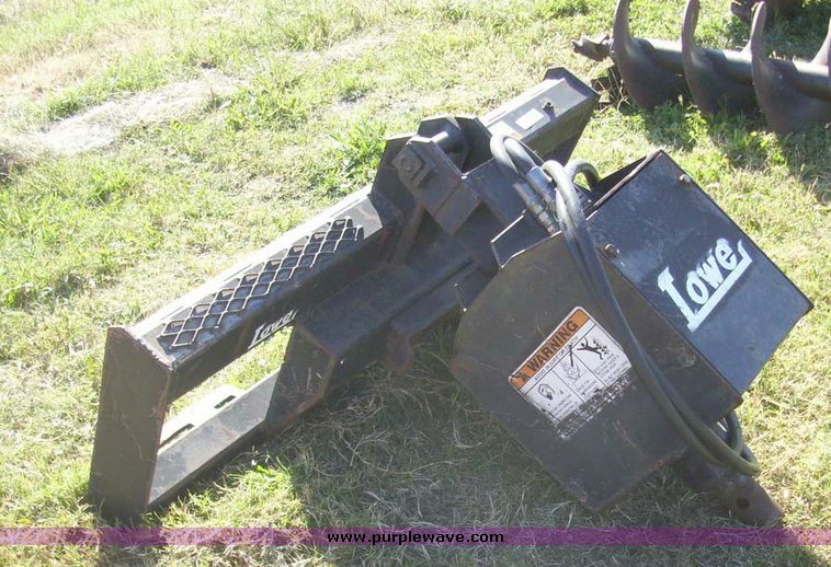 image for item 7619 Lowe hydraulic auger skid steer attachment
