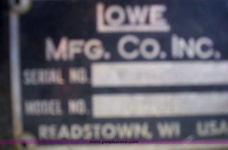 image for item 7619 Lowe hydraulic auger skid steer attachment