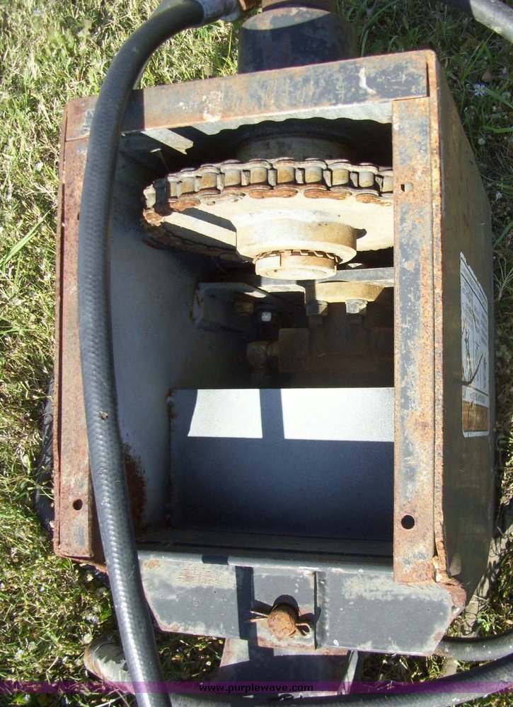 image for item 7628 Lowe hydraulic auger skid steer attachment