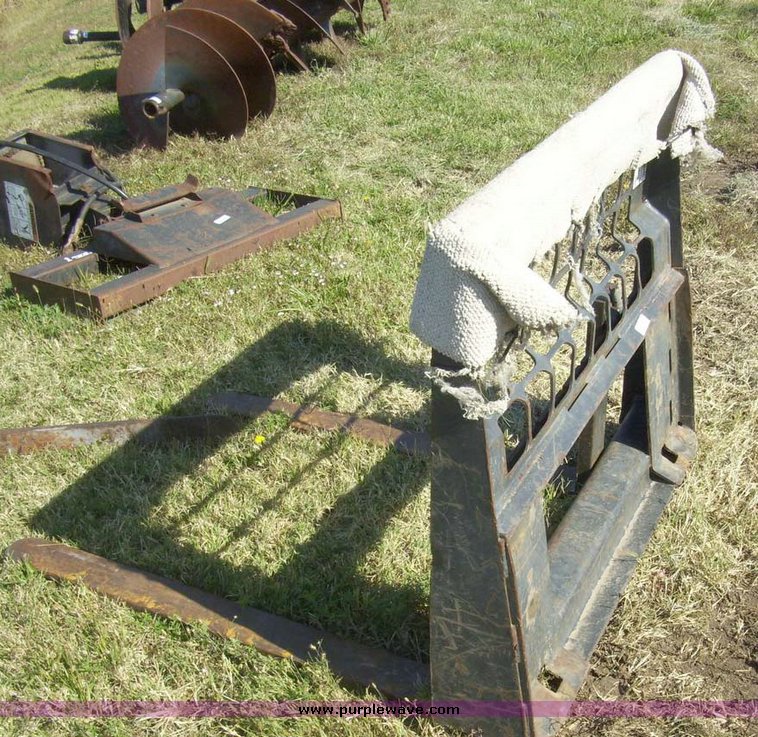 image for item 7629 Skid steer pallet fork attachment