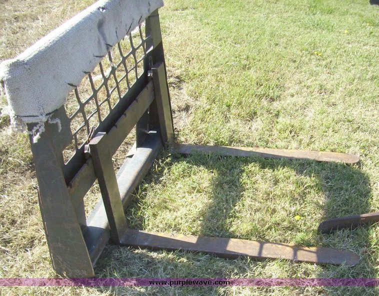 image for item 7629 Skid steer pallet fork attachment