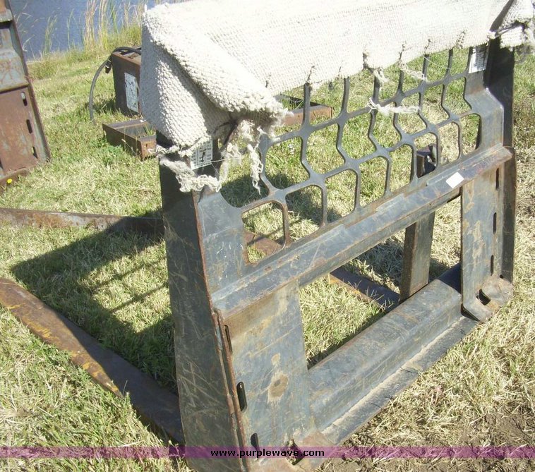 image for item 7629 Skid steer pallet fork attachment