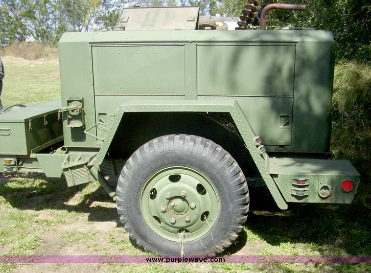 image for item 7705 U.S. welder and trailer