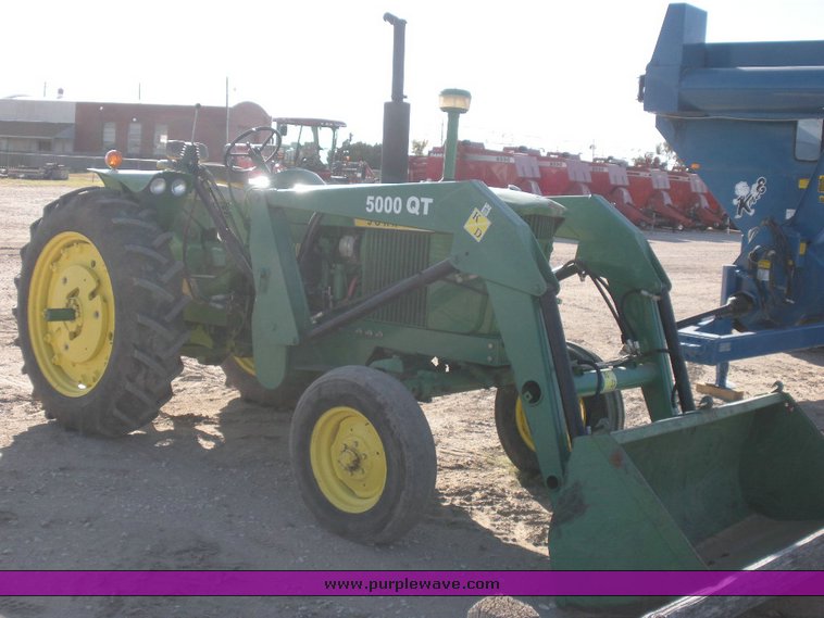image for item 1500 1968 John Deere 3020 tractor with KD loader attachment