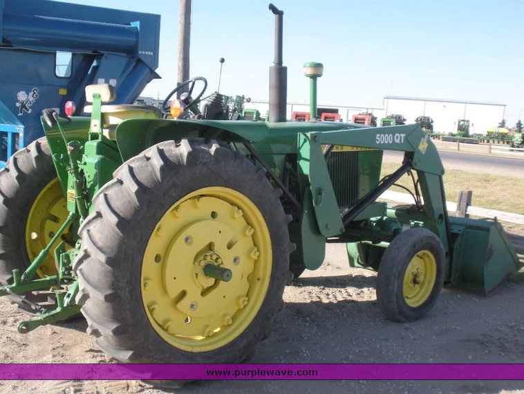 image for item 1500 1968 John Deere 3020 tractor with KD loader attachment