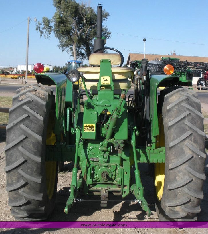 image for item 1500 1968 John Deere 3020 tractor with KD loader attachment