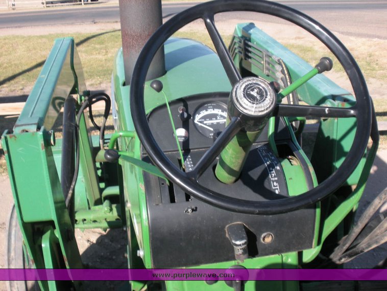 image for item 1500 1968 John Deere 3020 tractor with KD loader attachment