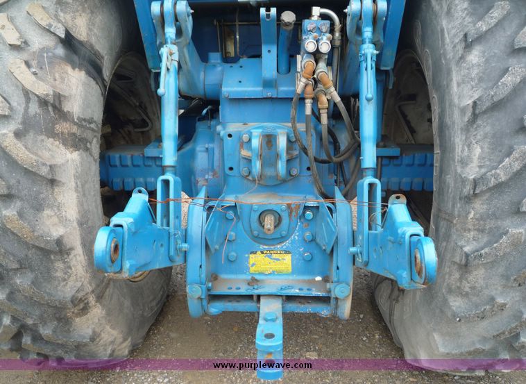 image for item 2063 1988 Ford TW15-2 tractor with Westendorf TA28 quick-attach loader