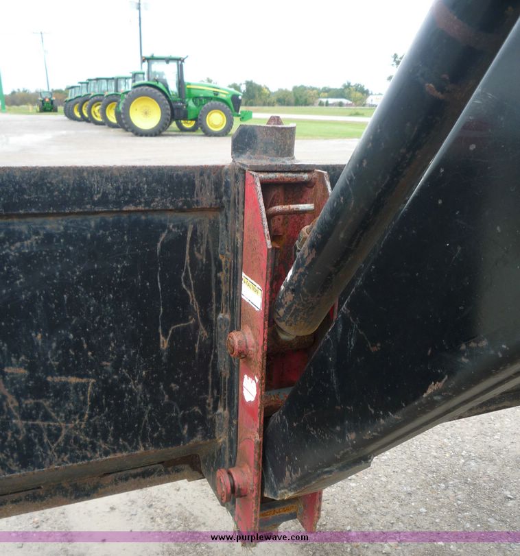 image for item 2063 1988 Ford TW15-2 tractor with Westendorf TA28 quick-attach loader