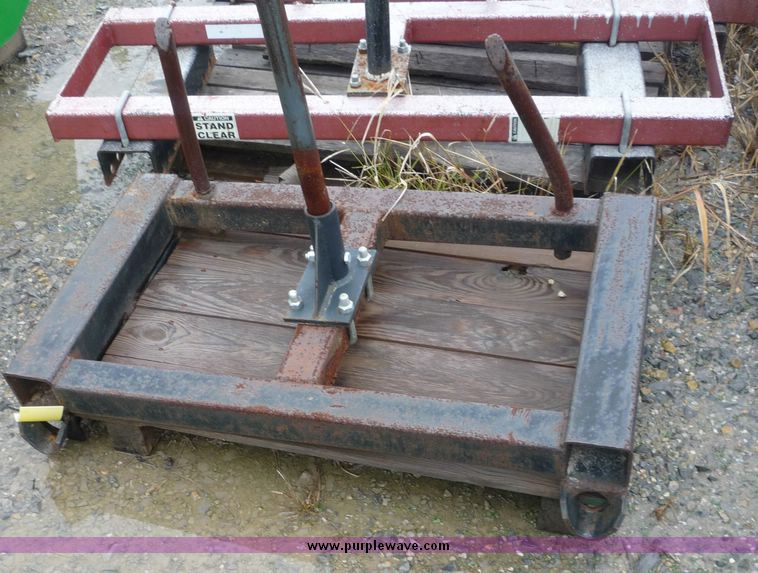 image for item 2063 1988 Ford TW15-2 tractor with Westendorf TA28 quick-attach loader