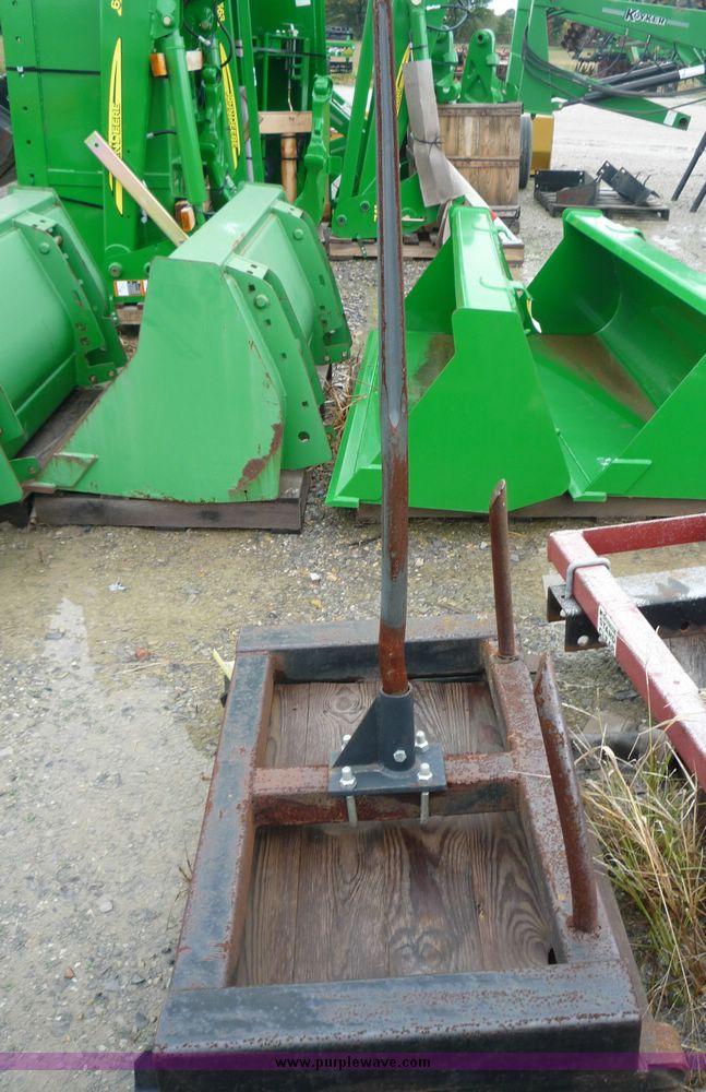 image for item 2063 1988 Ford TW15-2 tractor with Westendorf TA28 quick-attach loader