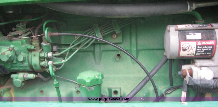 image for item 8974 1998 John Deere 4700 self propelled sprayer