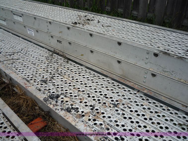 image for item 2219 (5) 24' x 24" scaffolding planks with guard rail