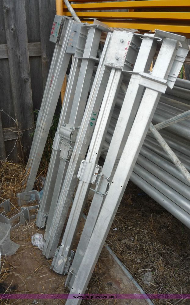 image for item 2219 (5) 24' x 24" scaffolding planks with guard rail