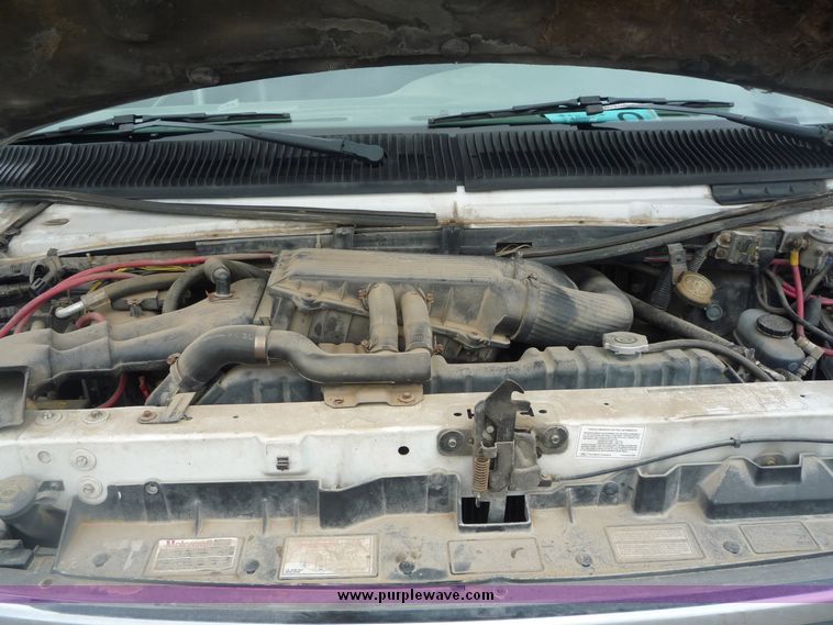 image for item 3598 1992 Ford E350 20 passenger bus