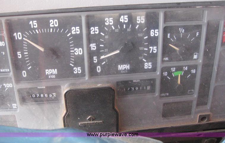 image for item 6544 1999 International 4900 dump truck with 13' dump bed and hoist