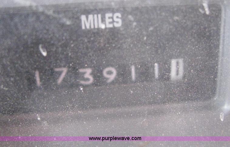 image for item 6544 1999 International 4900 dump truck with 13' dump bed and hoist