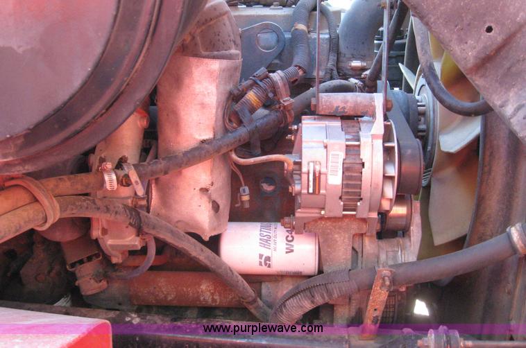 image for item 6544 1999 International 4900 dump truck with 13' dump bed and hoist