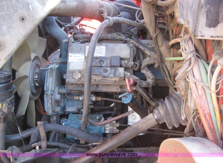 image for item 6544 1999 International 4900 dump truck with 13' dump bed and hoist