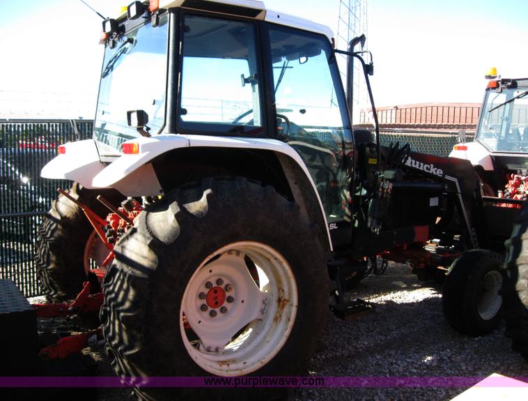 image for item 6547 1998 New Holland 6640SL wheel tractor