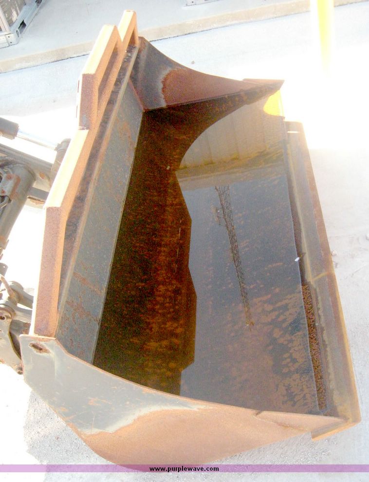 image for item 6553 2004 Quicke Q740 tractor-mounted loader