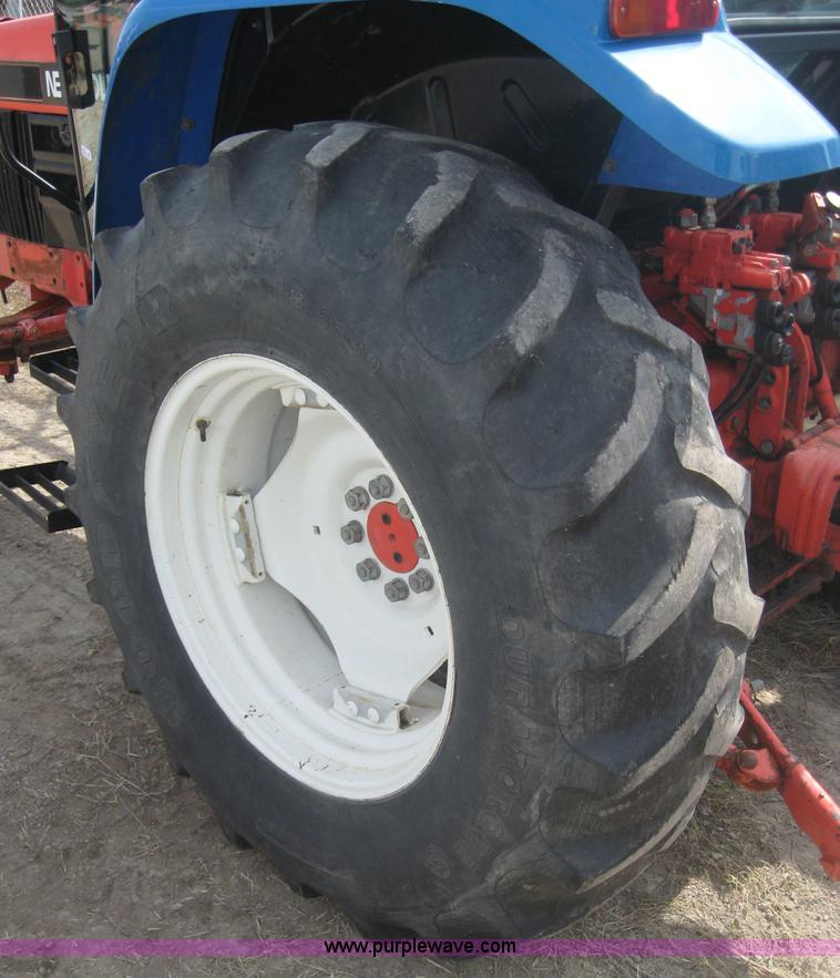 image for item 6665 1996 New Holland 6640SL wheel tractor