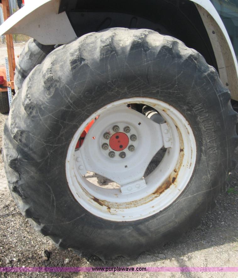 image for item 6666 1998 New Holland 6640SL wheel tractor