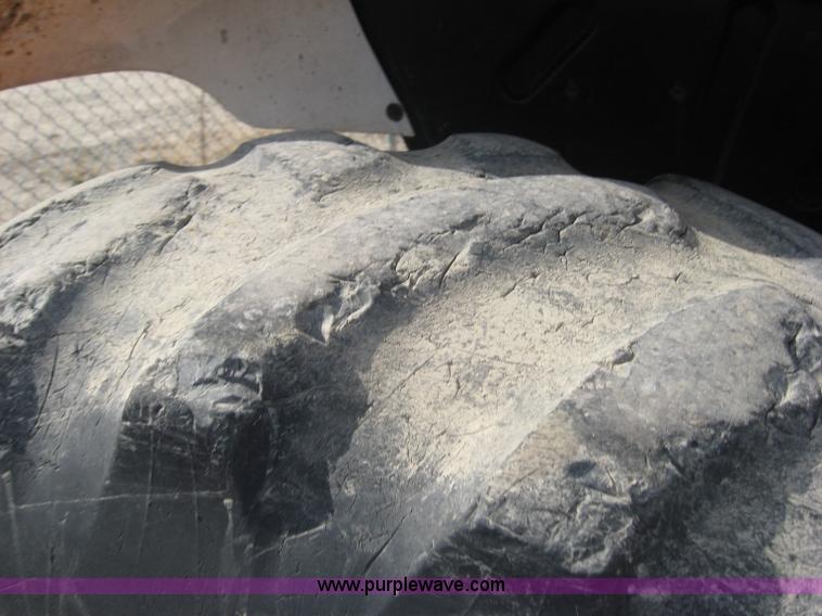 image for item 6666 1998 New Holland 6640SL wheel tractor