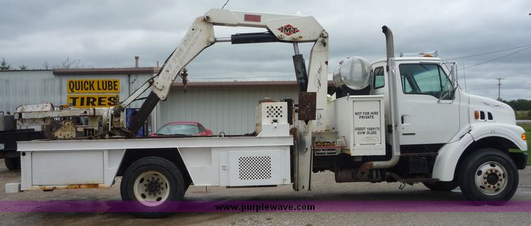 image for item 2235 1999 Sterling L7501 truck with 15' bed and five tool boxes