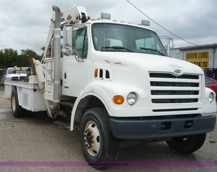 image for item 2235 1999 Sterling L7501 truck with 15' bed and five tool boxes