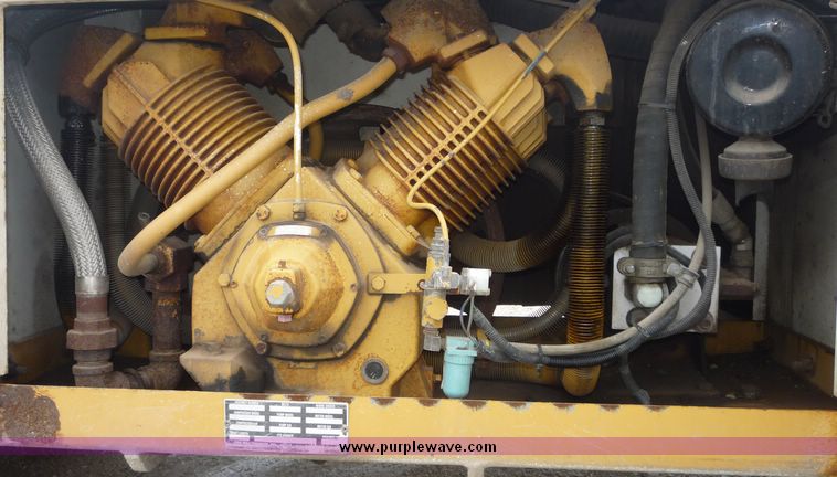 image for item 2235 1999 Sterling L7501 truck with 15' bed and five tool boxes