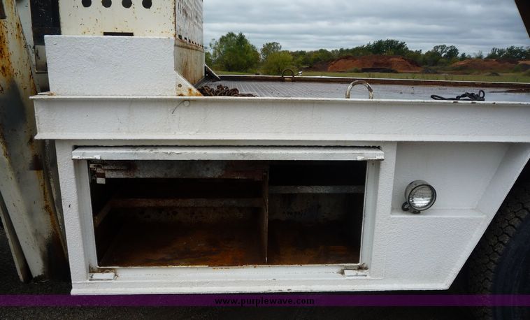 image for item 2235 1999 Sterling L7501 truck with 15' bed and five tool boxes