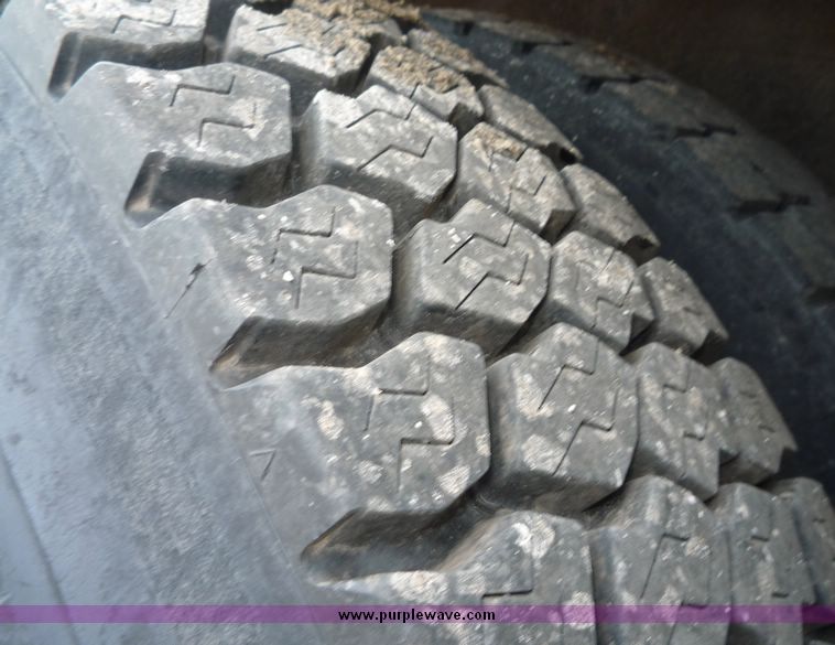 image for item 2235 1999 Sterling L7501 truck with 15' bed and five tool boxes