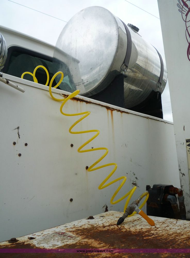 image for item 2235 1999 Sterling L7501 truck with 15' bed and five tool boxes