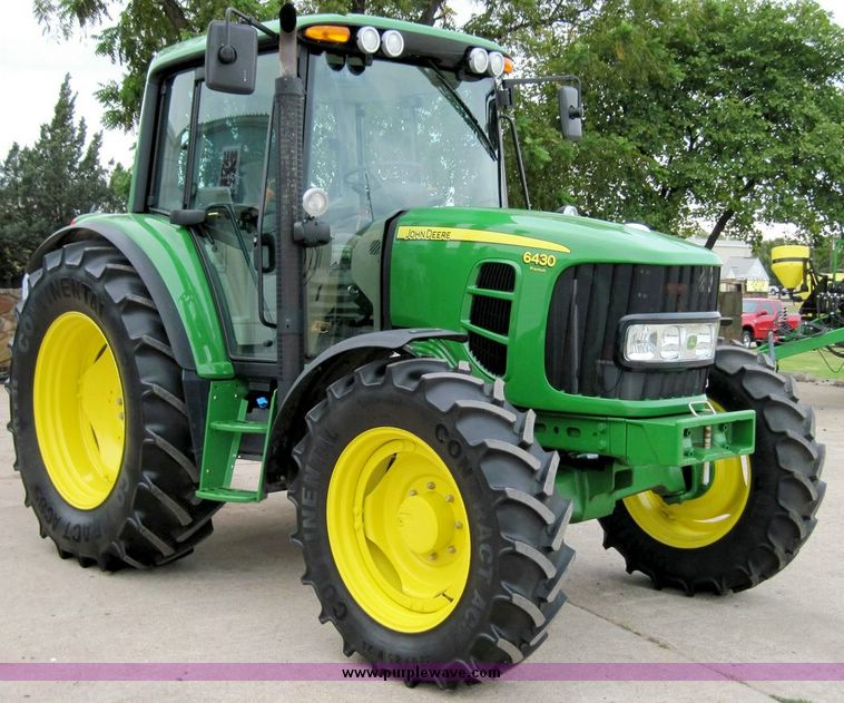 image for item 4417 2009 John Deere 6430 MFWD tractor