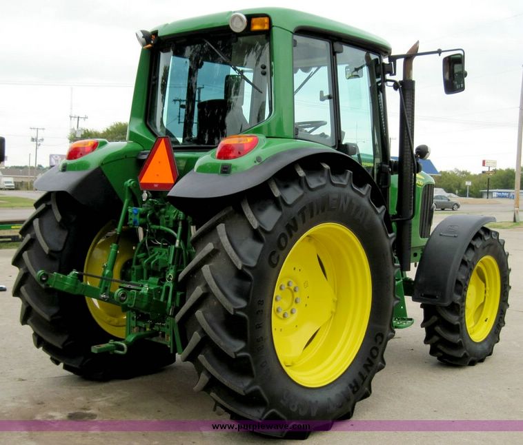 image for item 4417 2009 John Deere 6430 MFWD tractor