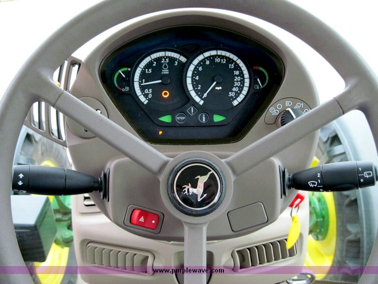 image for item 4417 2009 John Deere 6430 MFWD tractor