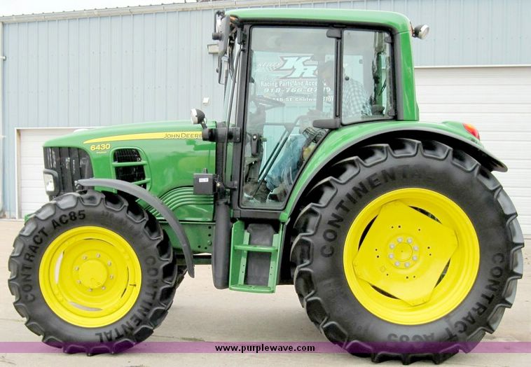 image for item 4417 2009 John Deere 6430 MFWD tractor