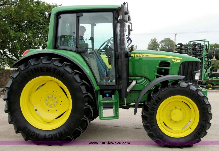 image for item 4417 2009 John Deere 6430 MFWD tractor