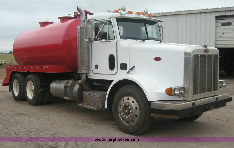 image for item 6698 1992 Peterbilt 378 tandem axle truck with 70 barrel tank