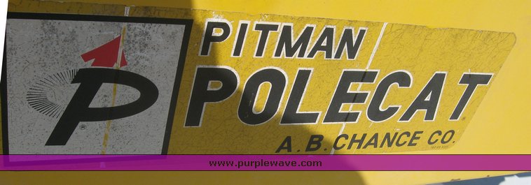 image for item 6722 1979 GMC truck with utility bed and Pitman Polecat 1500 boom arm with hydraulic driven auger and 18" bit