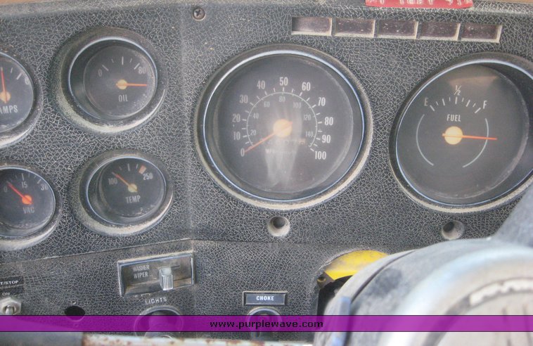 image for item 6722 1979 GMC truck with utility bed and Pitman Polecat 1500 boom arm with hydraulic driven auger and 18" bit