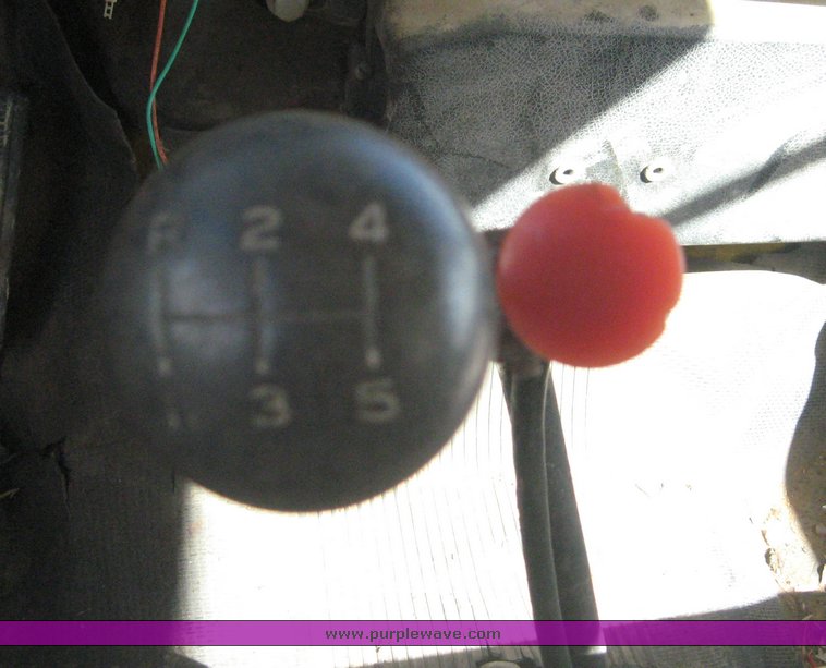 image for item 6722 1979 GMC truck with utility bed and Pitman Polecat 1500 boom arm with hydraulic driven auger and 18" bit