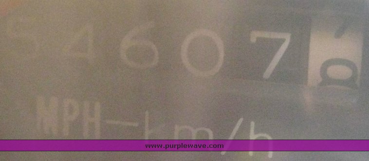 image for item 6722 1979 GMC truck with utility bed and Pitman Polecat 1500 boom arm with hydraulic driven auger and 18" bit