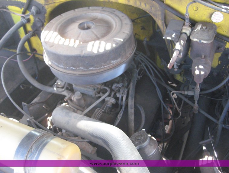 image for item 6722 1979 GMC truck with utility bed and Pitman Polecat 1500 boom arm with hydraulic driven auger and 18" bit