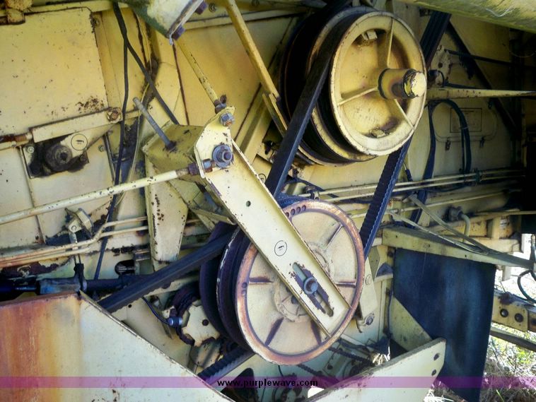 image for item 7528 New Holland TR70 combine with 20' platform with finger reel