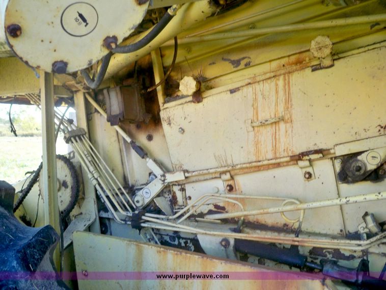 image for item 7528 New Holland TR70 combine with 20' platform with finger reel